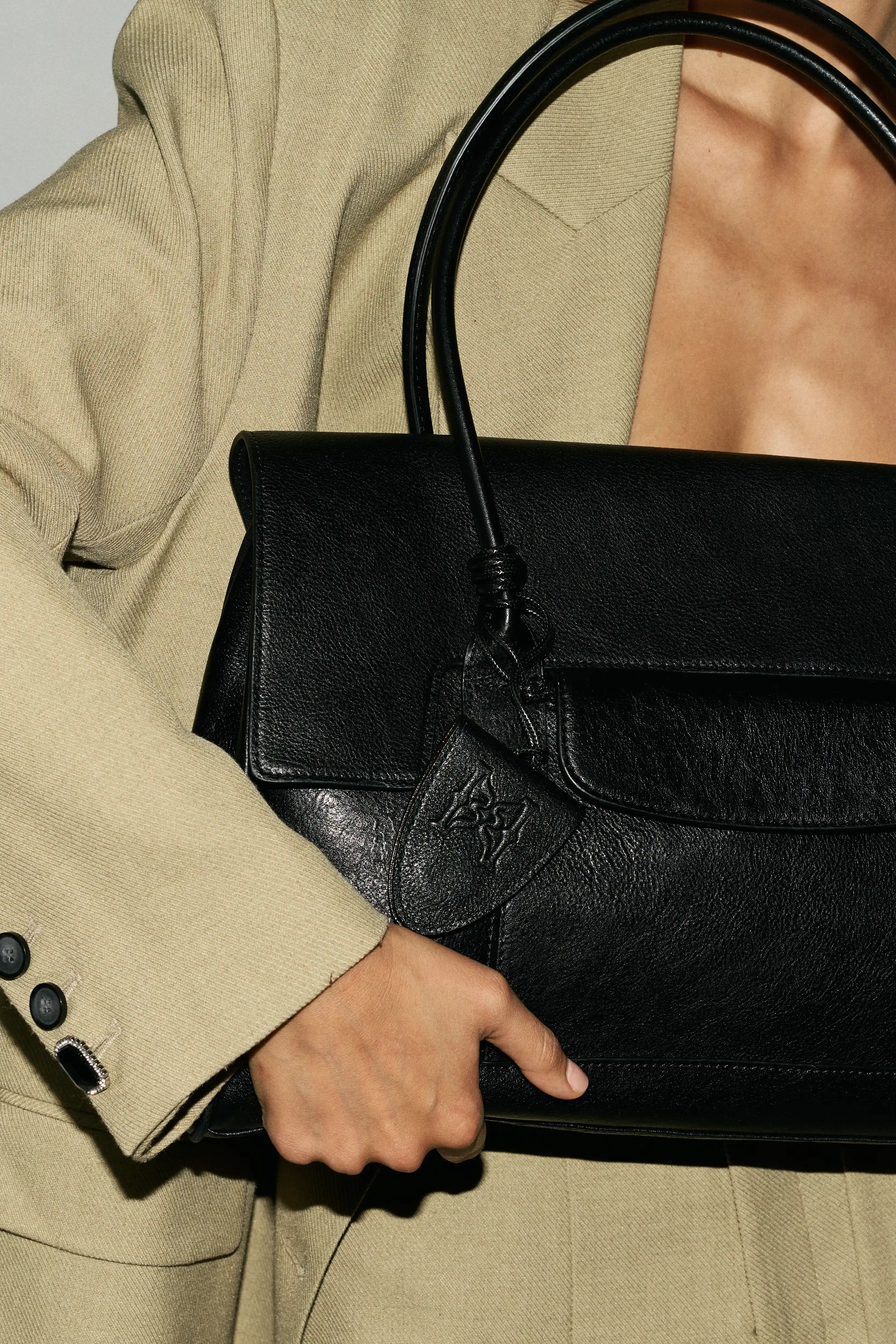 THE SIGNATURE BAG