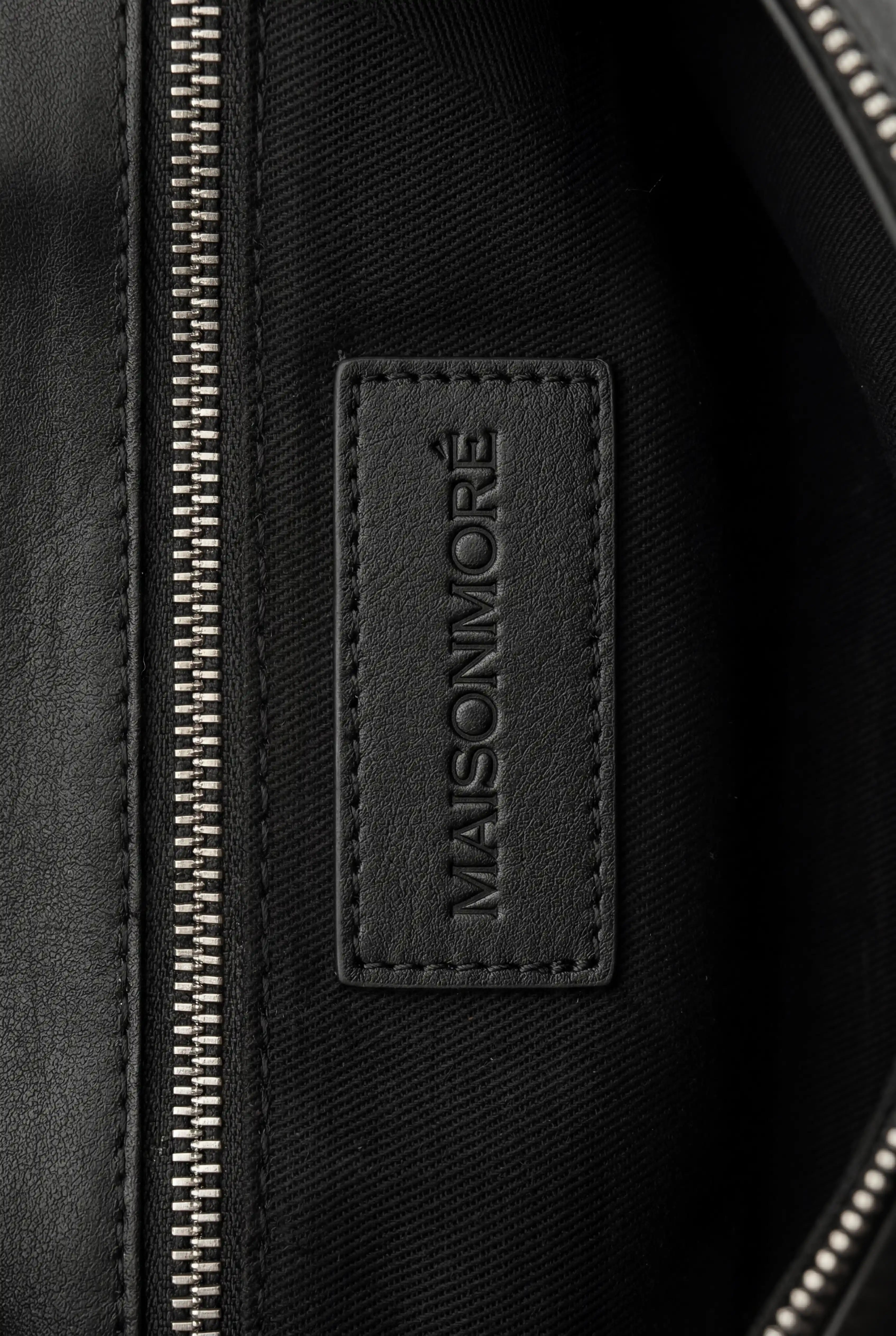THE SIGNATURE BAG
